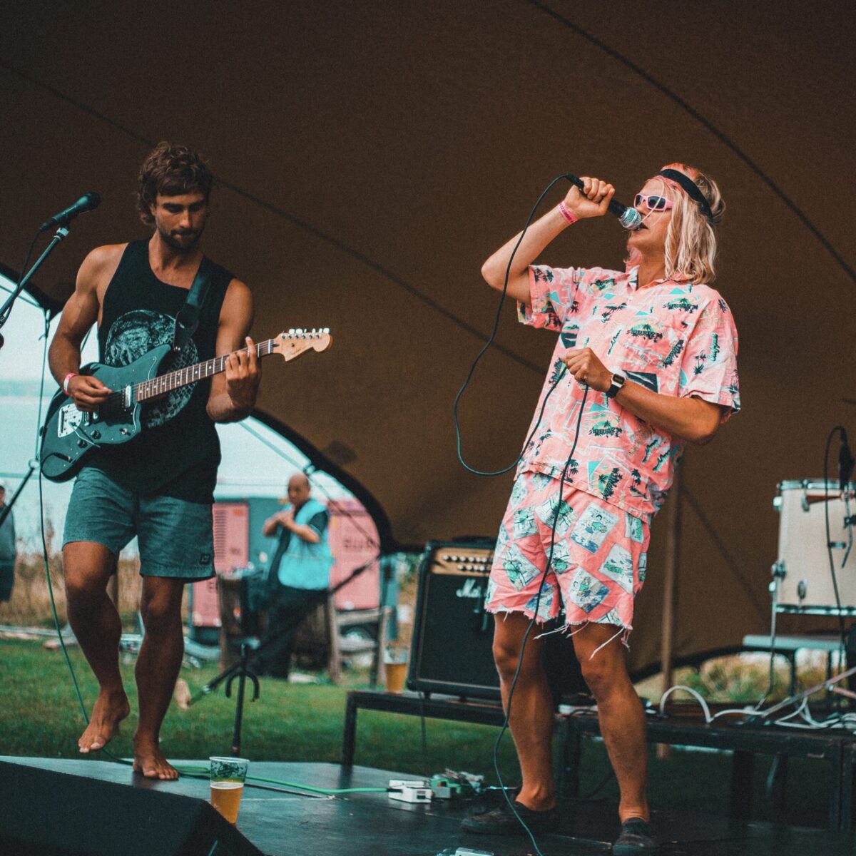 Nite Ryder from Half Kut wears La Favela Boardies & Dark Side of the Disco Wife Beater
